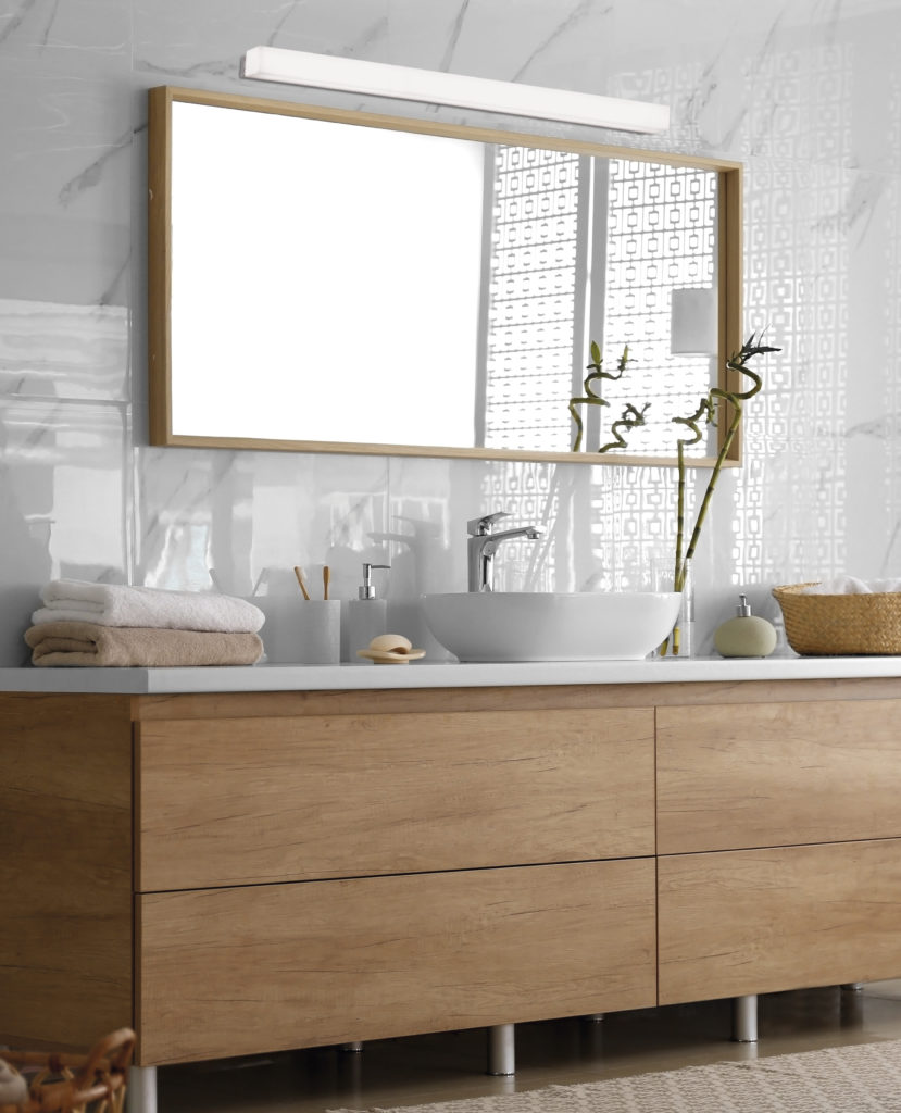 Modern bathroom interior with vessel sink and big mirror