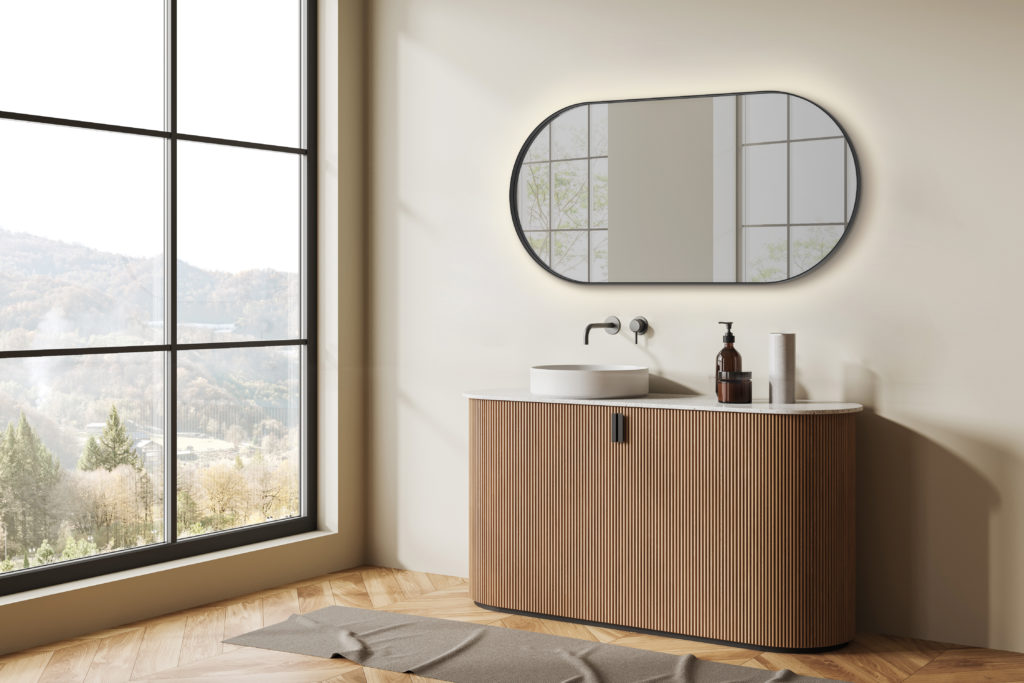 Beige bathroom interior with sink and dresser, decoration and panoramic window