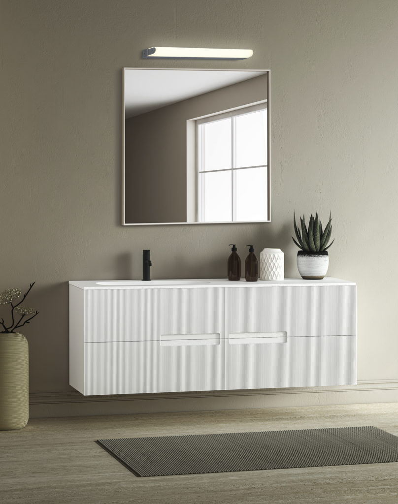 Bright minimal bathroom interior with white basin and oval mirro