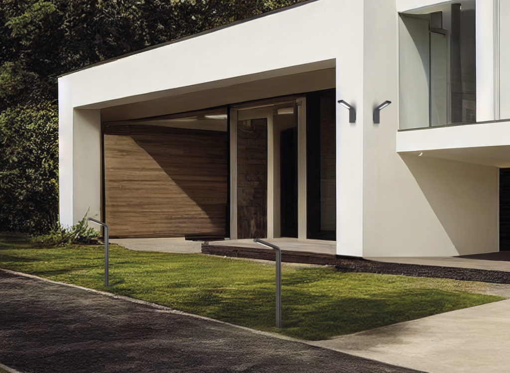 Beige one-storey modern house exterior with concrete walkway nearby